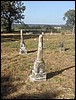 SUE<BR>C.F.<BR>Tombstone in Foreground